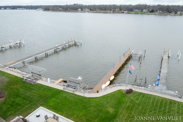 585 Crescent Dr, Holland, MI 49423 - exterior space featuring a water view, a yard, and boat lift