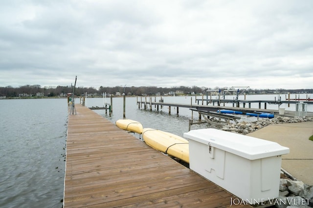 585 Crescent Dr, Holland, MI 49423 - view of dock with boat lift and a water view