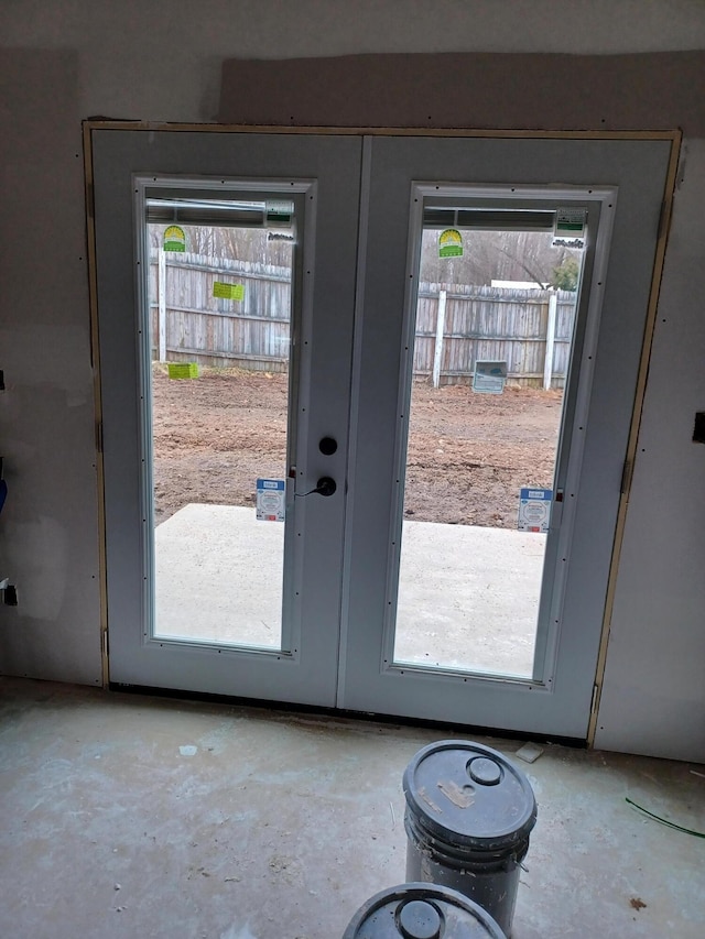 doorway to outside with french doors and a wealth of natural light