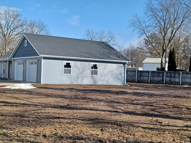 exterior space with a garage