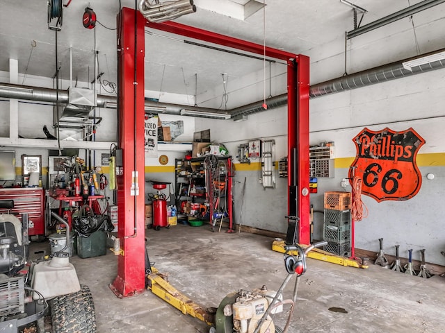 garage with a workshop area