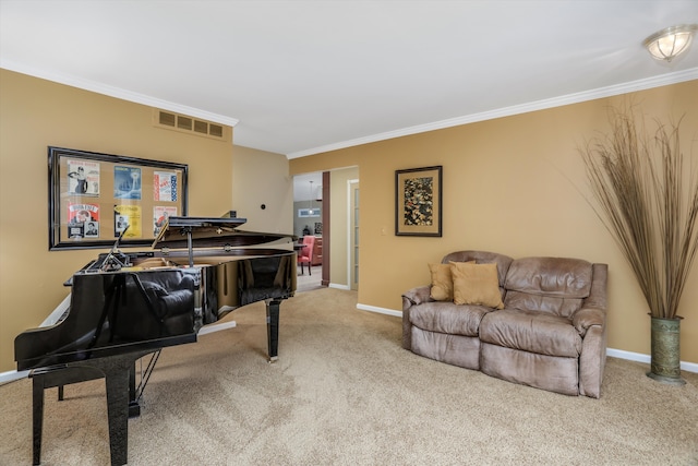 sitting room featuring crown molding and carpet floors