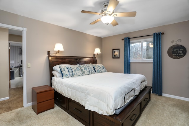 bedroom with ceiling fan and light colored carpet