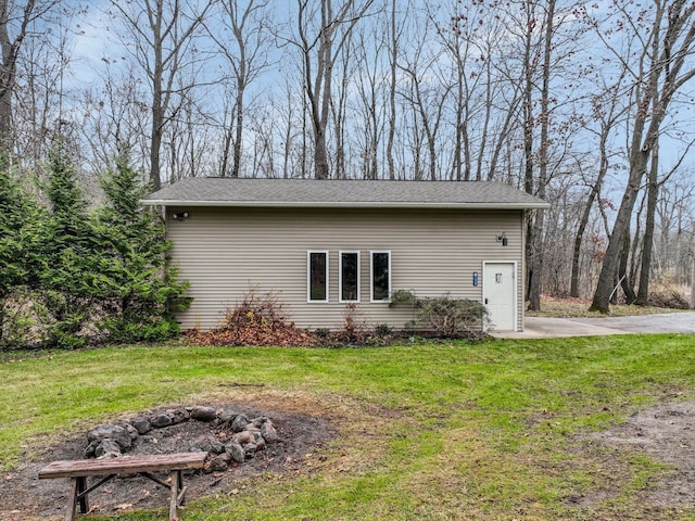 view of home's exterior with a yard