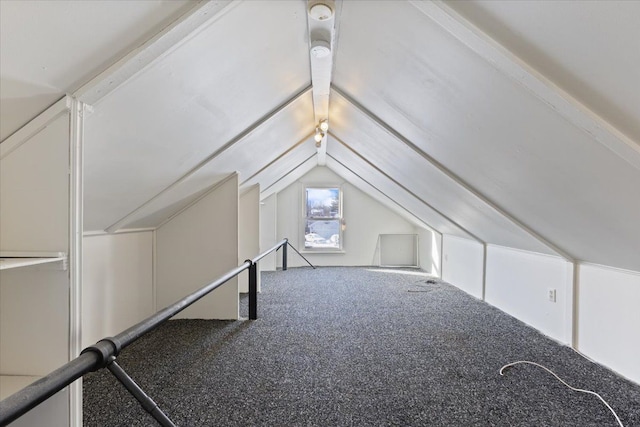 bonus room featuring carpet and lofted ceiling