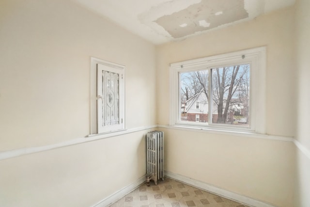 empty room featuring radiator