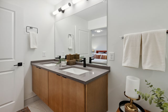 bathroom featuring tile patterned floors and vanity