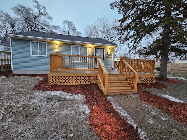 view of front of home with a deck