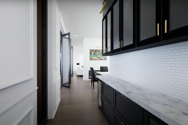 hallway with dark wood finished floors