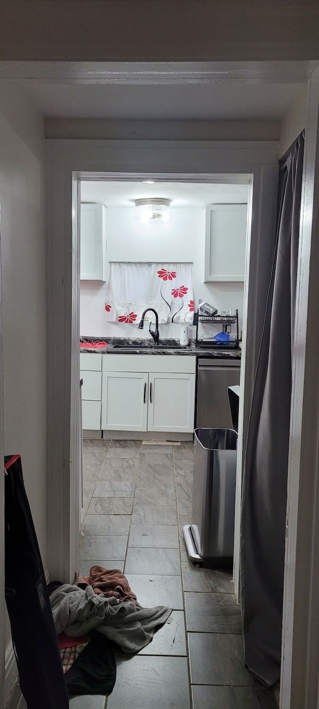 kitchen with white cabinets and sink