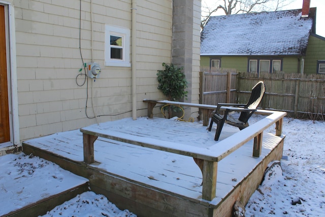 view of snow covered deck