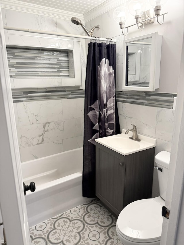 full bathroom with vanity, toilet, ornamental molding, tile walls, and shower / tub combo