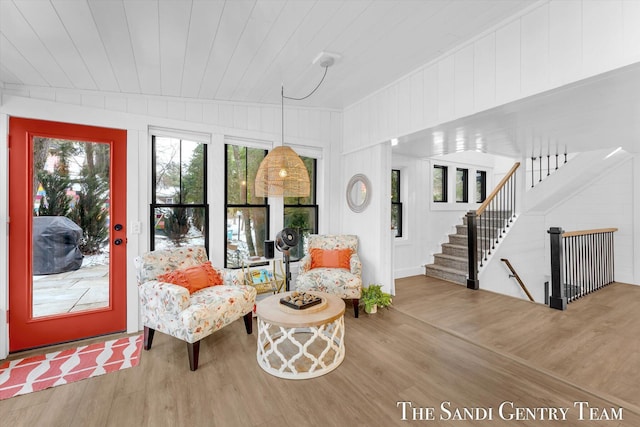 interior space with hardwood / wood-style floors and wooden ceiling