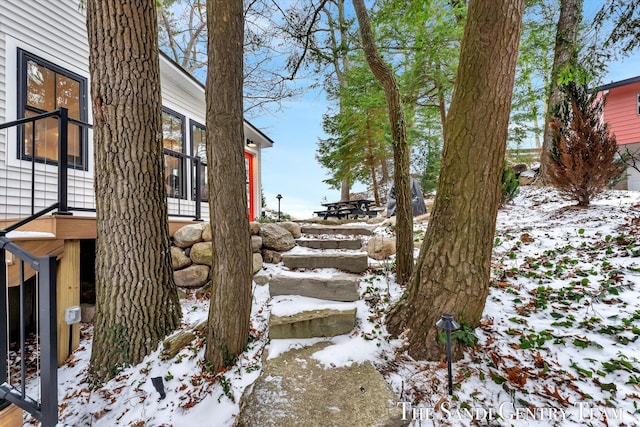 view of yard layered in snow