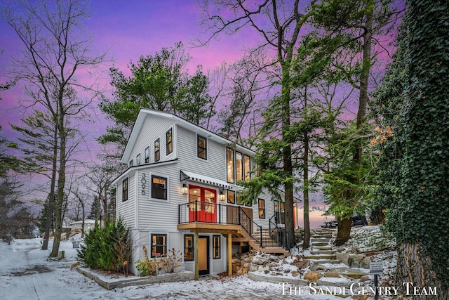 view of front of property featuring a wooden deck