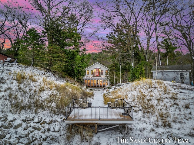 surrounding community with a wooden deck