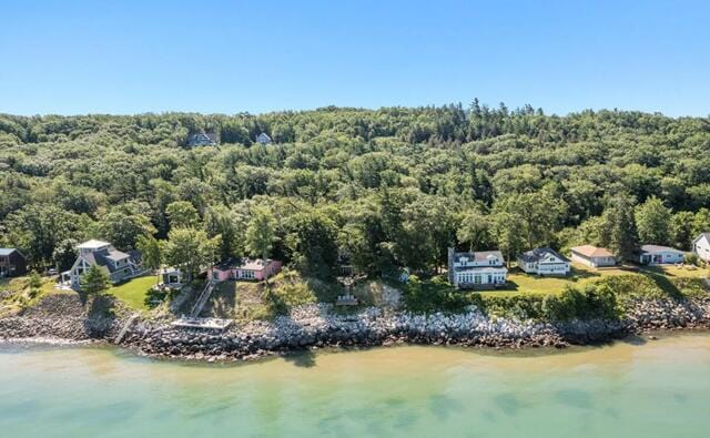 aerial view featuring a view of the beach and a water view