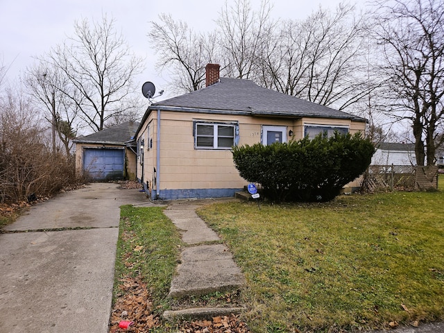 view of home's exterior featuring a yard and a garage