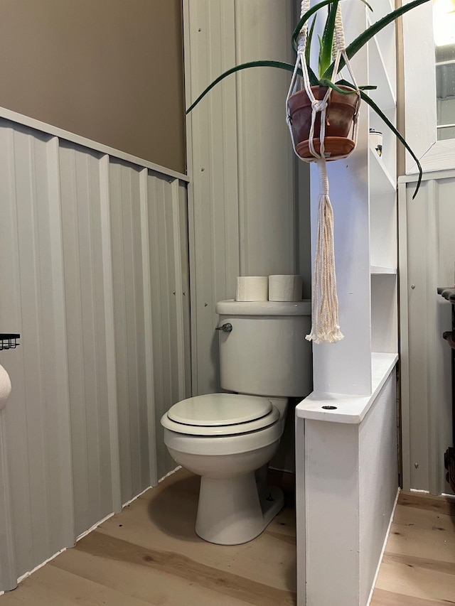 5721 N Rossman Rd W, Kingston, MI 48741 - bathroom featuring wood finished floors and toilet