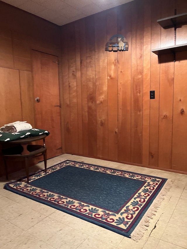 5721 N Rossman Rd W, Kingston, MI 48741 - foyer entrance featuring wooden walls