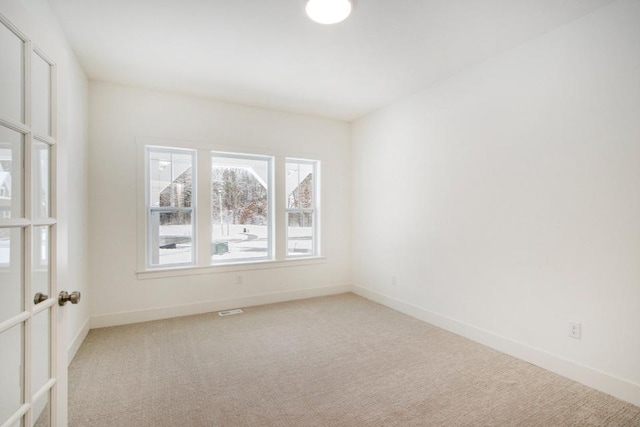 view of carpeted spare room