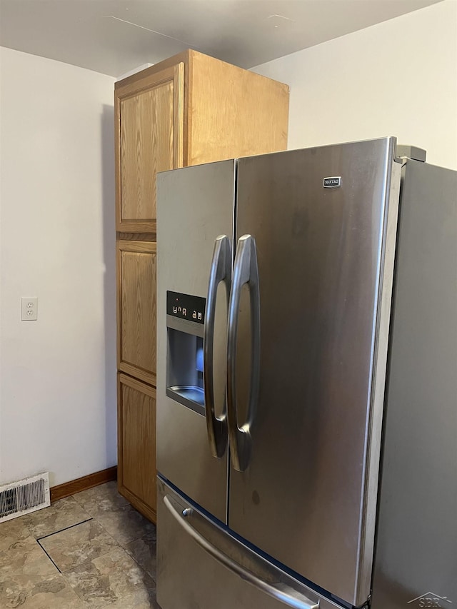 kitchen with stainless steel fridge