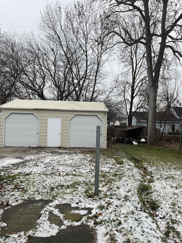 view of snow covered garage