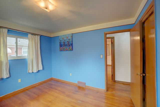 empty room featuring light hardwood / wood-style floors