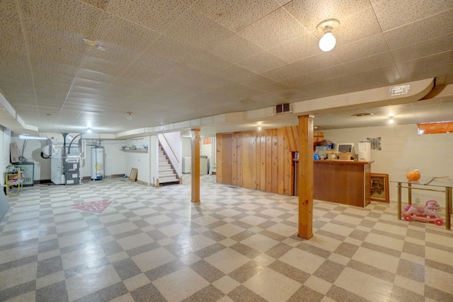 basement with heating unit and water heater