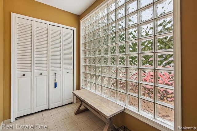 interior space with light tile patterned floors