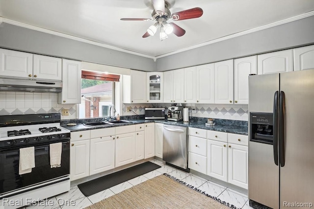 kitchen featuring white cabinetry, sink, stainless steel appliances, and ornamental molding