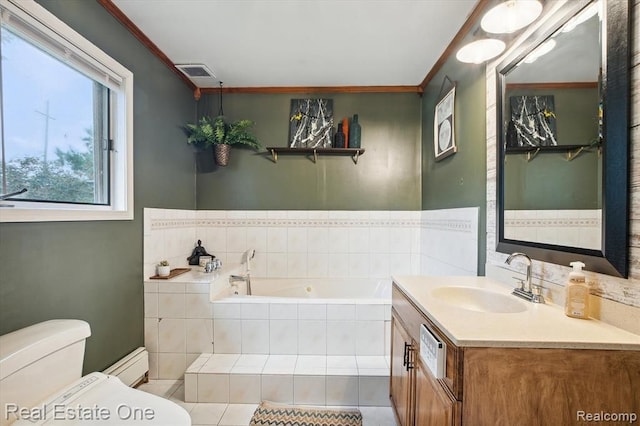 bathroom with tiled bath, toilet, vanity, and ornamental molding