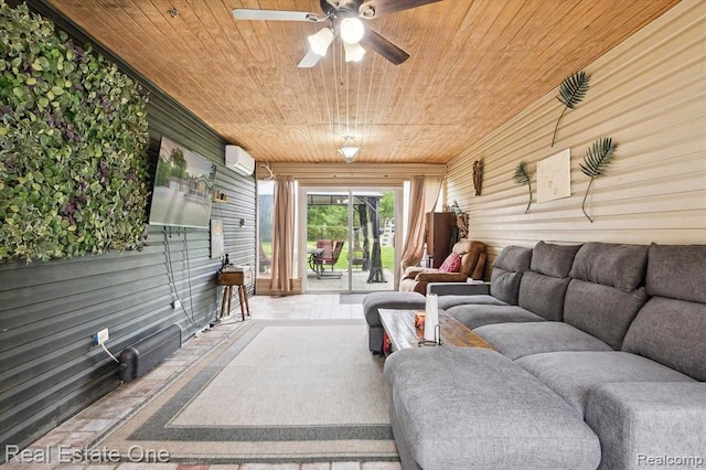 living room with an AC wall unit, wooden walls, ceiling fan, and wood ceiling