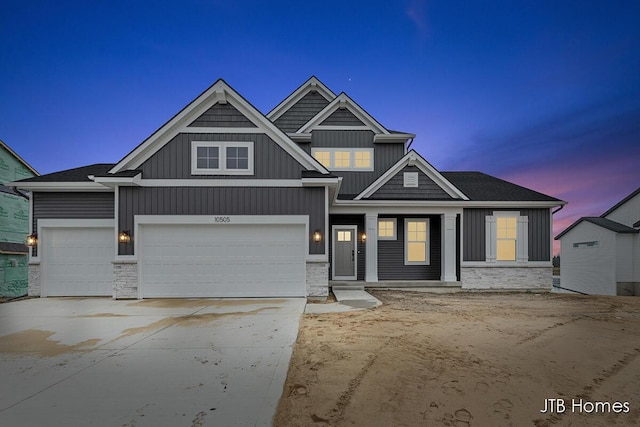 craftsman-style home with a garage