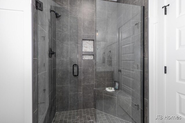 bathroom with a stall shower