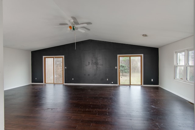 unfurnished room with dark hardwood / wood-style floors, ceiling fan, and vaulted ceiling