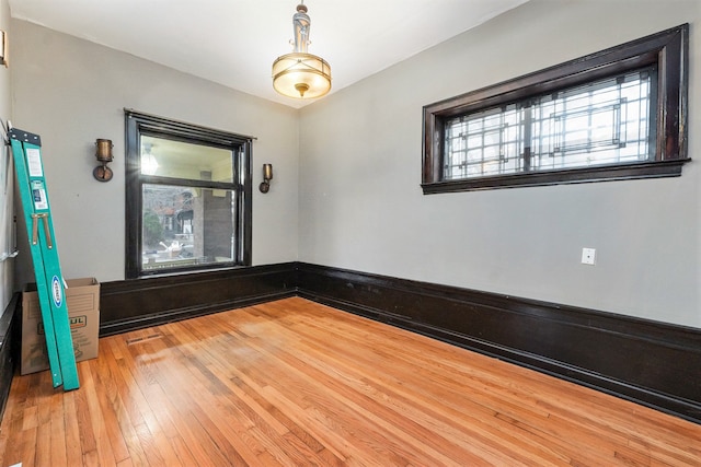 empty room featuring hardwood / wood-style flooring