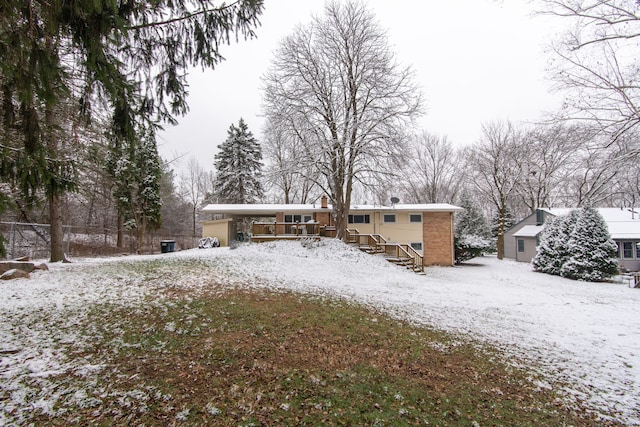 44080 Marlson Ave, Novi, MI 48375 - snow covered property with brick siding and an attached carport