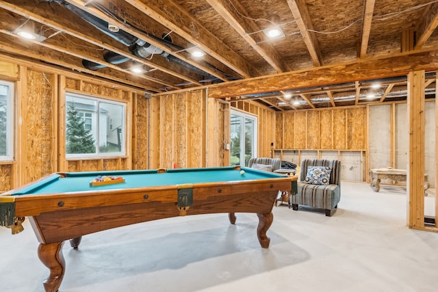 game room featuring concrete flooring, plenty of natural light, and billiards