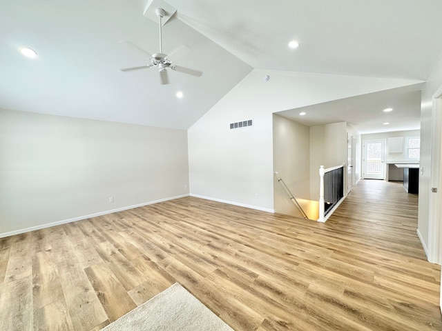 additional living space featuring ceiling fan, high vaulted ceiling, and light hardwood / wood-style floors