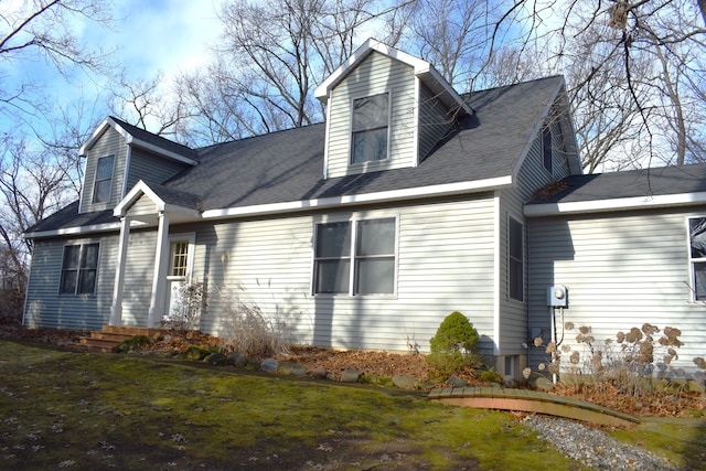 view of property exterior featuring a yard