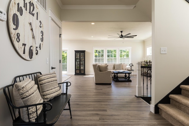 corridor with visible vents, crown molding, stairway, recessed lighting, and dark wood-style flooring