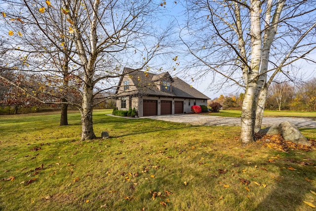 view of yard with a garage