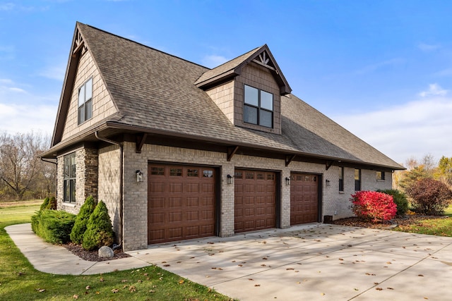 view of side of home featuring a garage