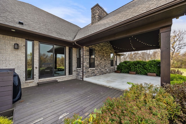 deck featuring a patio area