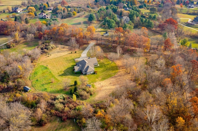 birds eye view of property featuring a rural view