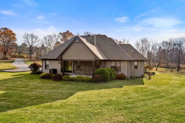 view of home's exterior featuring a yard