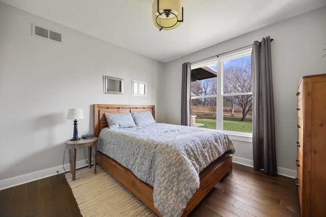 bedroom featuring hardwood / wood-style floors