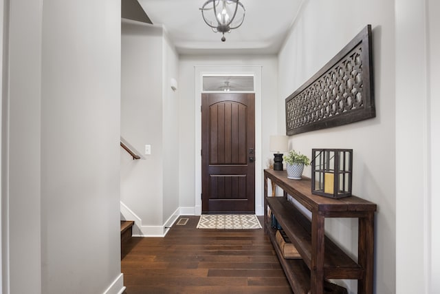 entryway with dark hardwood / wood-style floors