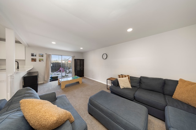 living room with light colored carpet